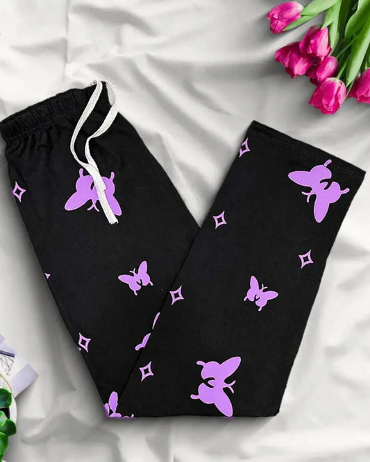 Black lounge trousers with a purple butterfly print and a white drawstring.