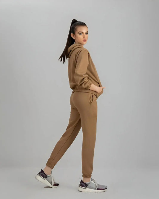 Camel brown cozy co-ord set with a hoodie and pants.