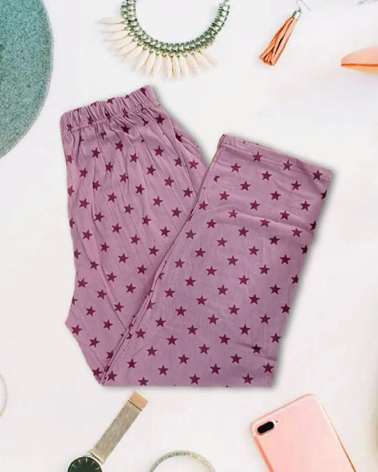 Pink or dusty rose lounge trousers with a star print.