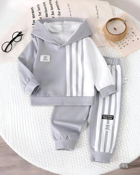 A kids' two-piece winter suit in a solid grey color with a subtle linear print.