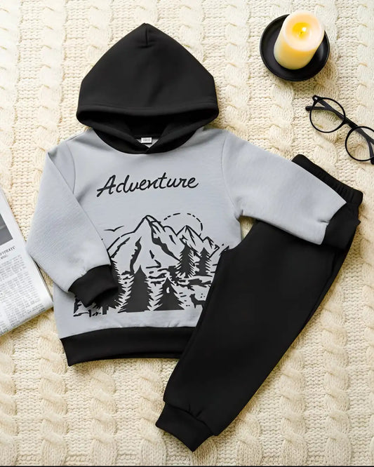 Kids' winter fleece suit with adventure print—a warm and stylish outfit for boys and girls