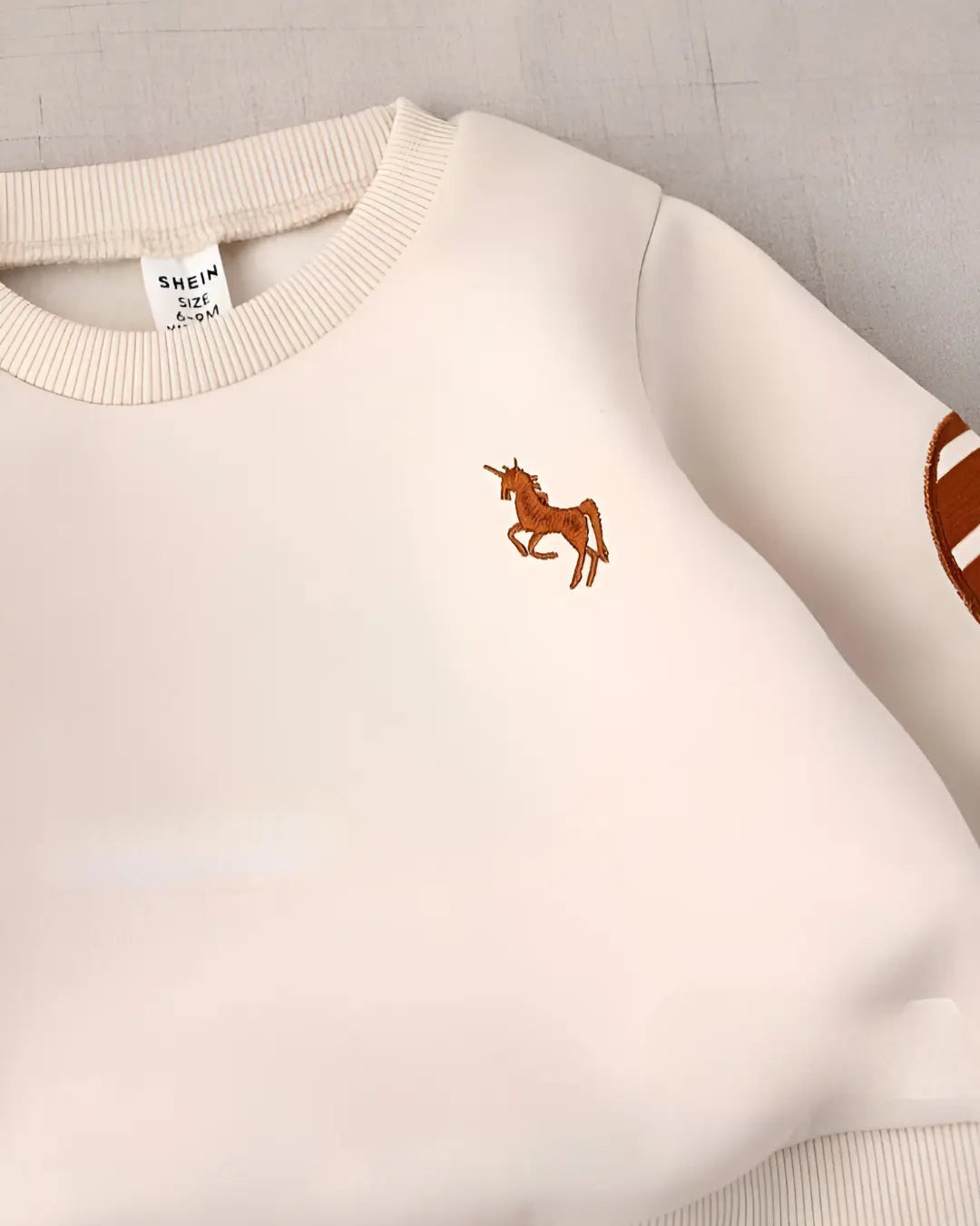 "Kids' winter fleece suit with horse print—a warm, cozy outfit for boys and girls"