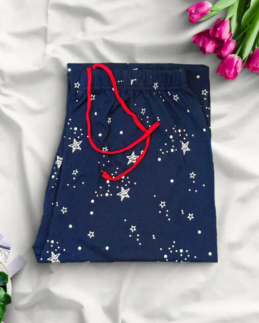 Navy blue galaxy print trousers, a comfortable pajama with star and dot pattern.