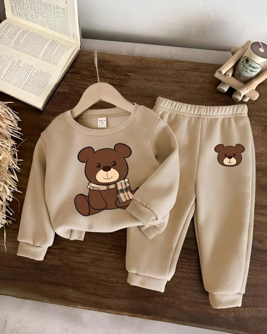 A kids' two-piece winter suit with a cute, repeating teddy bear print.